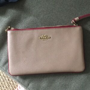 Coach salmon colored zip wallet